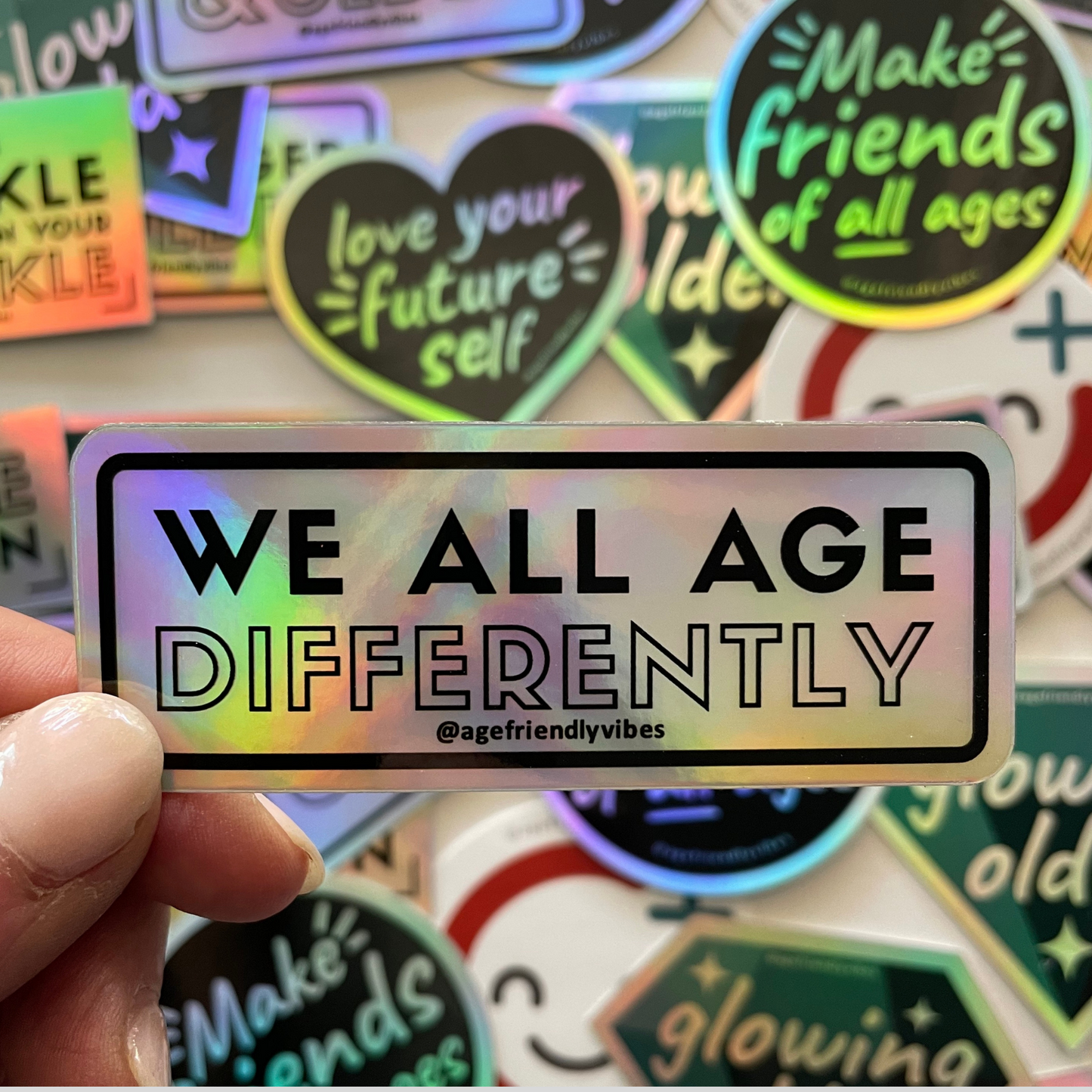 We all age differently Holographic Sticker