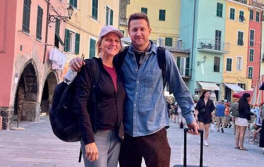 Two people standing in a road in Italy